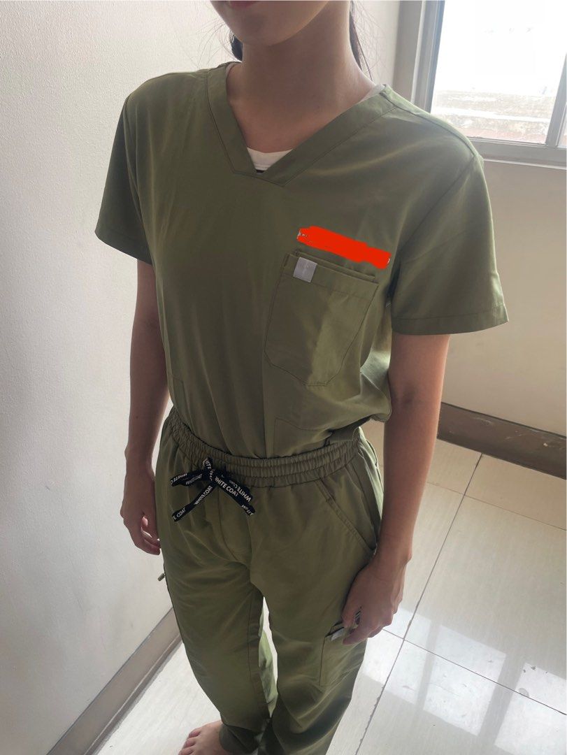 Whitecoat manila scrubs (Category: Sets or Coordinates) located in San Juan City. Submitted by prelovedstuff_01 (Listing ID 1457018334, Image 3). Description: With embroidery. Pa remove niyo na lang 🥹 Size small both top and pants. Love the color of this!!! 💚 not faded, no discoloration, no stains.