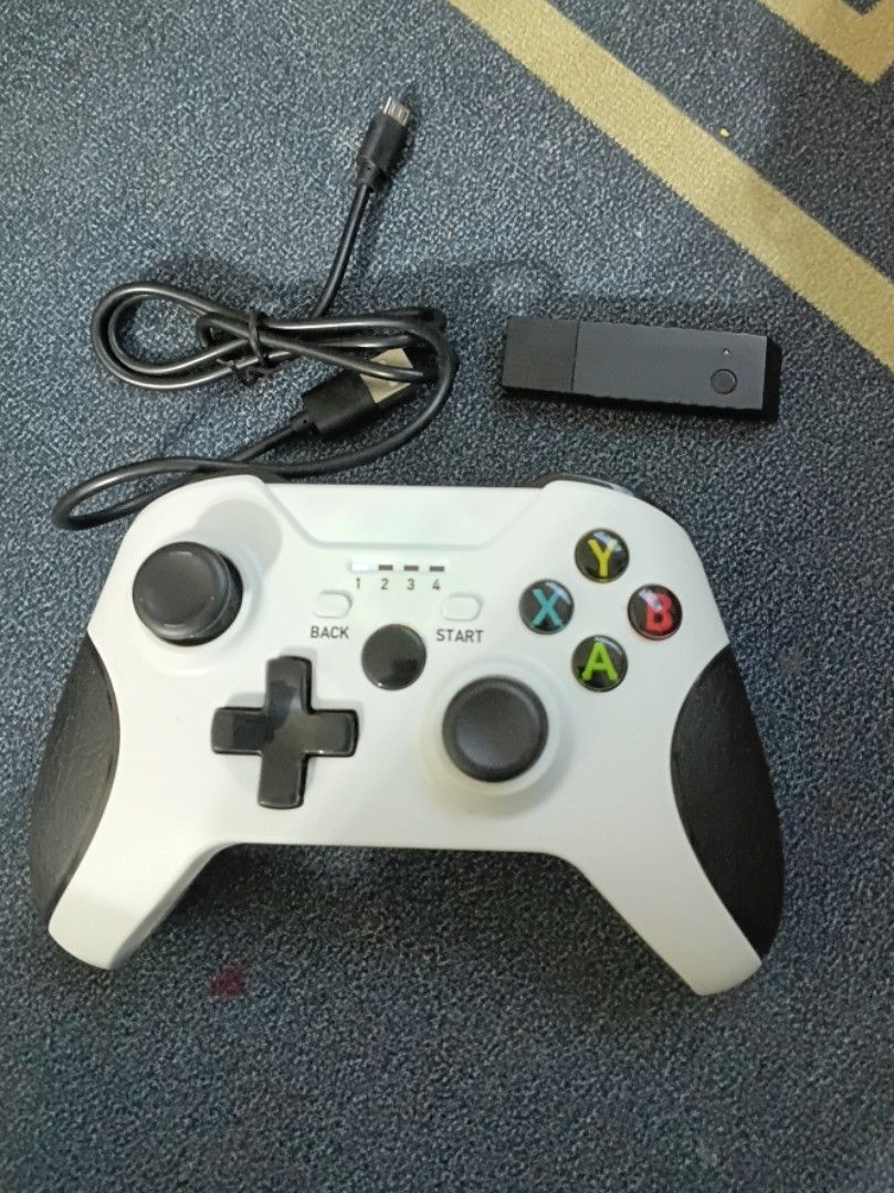 Wireless controller (Category: Controllers) located in Johor Bahru. Submitted by semalamcakaplain (Listing ID 1457103188, Image 1). Description: Wireless controller with dongle 1x Wireless controller 1x dongle 1x usb cable.