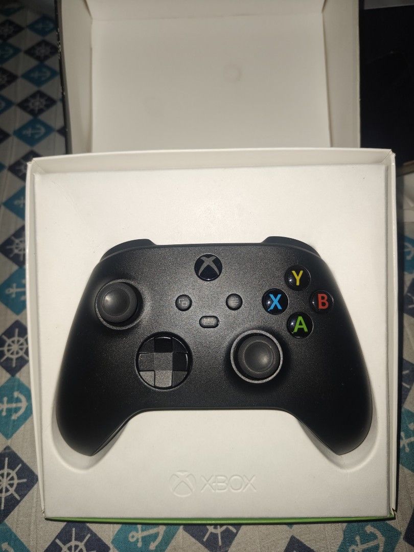 Xbox Carbon Black Wireless Controller (Category: Controllers) located in Caloocan City. Submitted by zealwind.6c23d3 (Listing ID 1457083504, Image 1). Description: - Xbox Carbon Black Wireless Controller - Excellent working condition - Includes batteries - Original box included - Ready for immediate gaming.