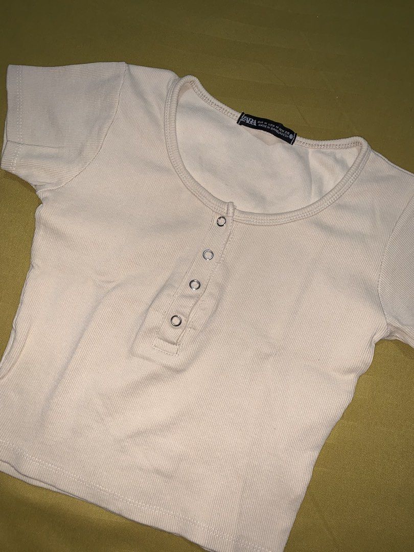 Zara Basic Top (Category: Shirts) located in Manila. Submitted by _wtfrn (Listing ID 1457074816, Image 2). Description: Selling my preloved but well loved clothes🎀 📌White Basic Top with 3 buttons on front 📌Color may vary due to lightning 📌Size: S-M 📍Quezon City 🛵Lalamove & Meet up nearby 💌: message me if your interested and will give you discounts🤗 .
