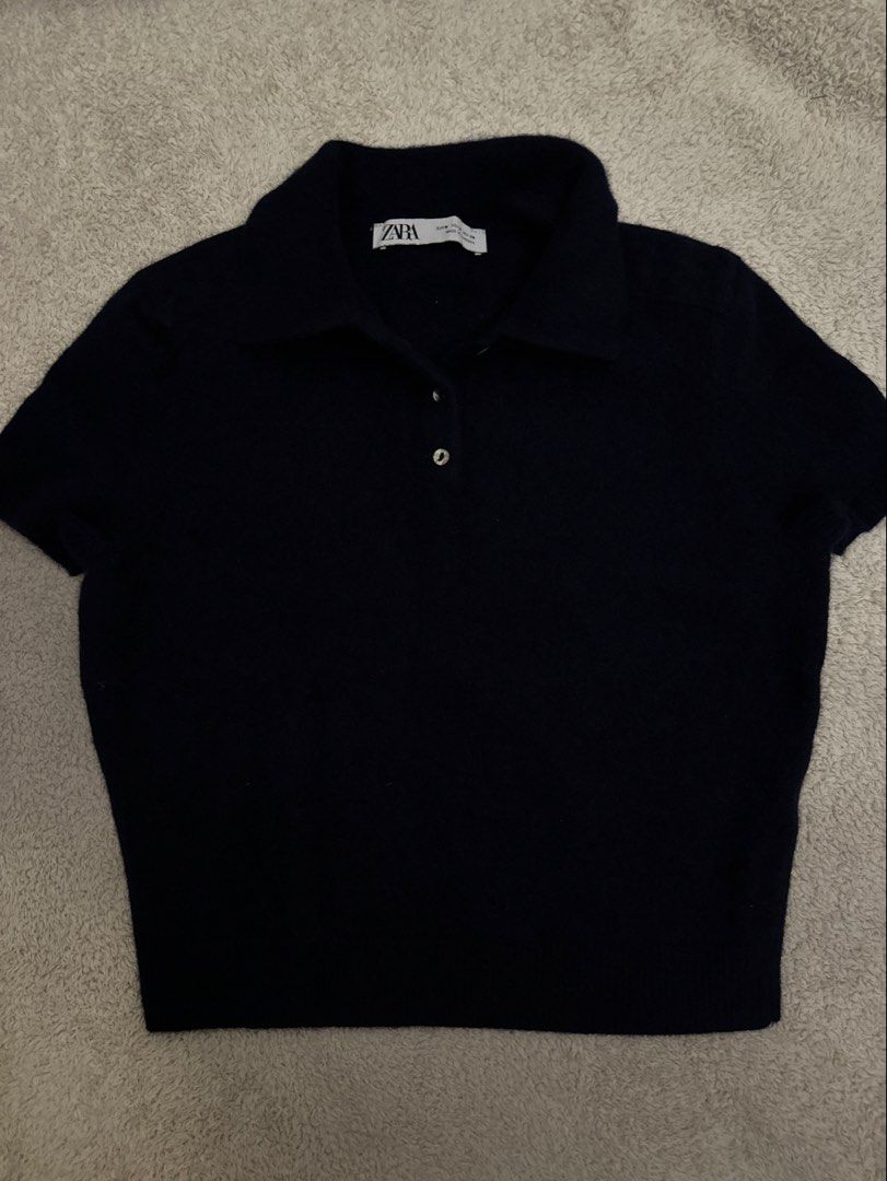Zara knit top in navy blue (Category: Blouses) located in Mandaluyong City. Submitted by declutterstuff12 (Listing ID 1457112602, Image 1). Description: Used once. Runs small.