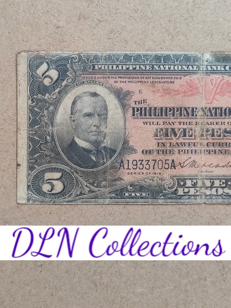 1916 PNB 5 Pesos Philippine Banknote (Category: Currency) located in Cavite. Submitted by dln_collections (Listing ID 1457241083, Image 3). Description: Authentic Philippine 5 Pesos 1916 issue, a rare piece from the American colonial era. This note carries immense historical value, representing the early 20th-century monetary system in the Philippines. While showing signs of circulation such as folds, creases, and pen marks, it remains a signific