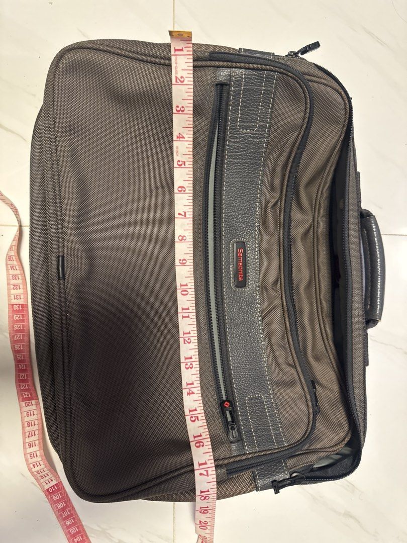 2027 Samsonite Laptop Bag Briefcase (Category: Briefcases) located in Silang. Submitted by sari2bilina (Listing ID 1457188923, Image 3). Description: - Brand: Samsonite - Color: Brown - Features: Multiple compartments, sturdy handle, smooth zippers - Dimensions: Approx. 16" (L) x 12" (H) x 5" (D) - Ideal for: Work, travel, everyday use.