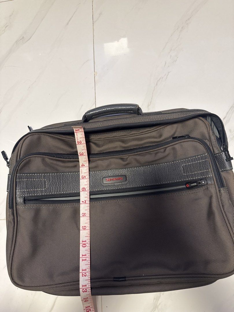 2027 Samsonite Laptop Bag Briefcase (Category: Briefcases) located in Silang. Submitted by sari2bilina (Listing ID 1457188923, Image 1). Description: - Brand: Samsonite - Color: Brown - Features: Multiple compartments, sturdy handle, smooth zippers - Dimensions: Approx. 16" (L) x 12" (H) x 5" (D) - Ideal for: Work, travel, everyday use.