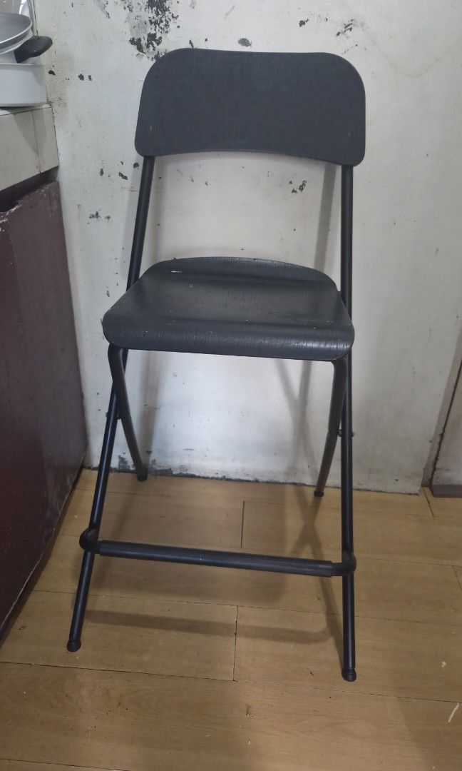 2 IKEA Foldable Bar Stool (Category: Chairs) located in Pasig City. Submitted by diwannag (Listing ID 1457174705, Image 2). Description: IKEA Franklin bar stool with a backrest, priced at ₱1,999 on the IKEA Philippines Store. Selling 2 chairs for 1000. Foldable counter-height bar stool Black-on-black wood veneer and steel frame Seat height of 63 cm Shows minor scuffs from normal use .