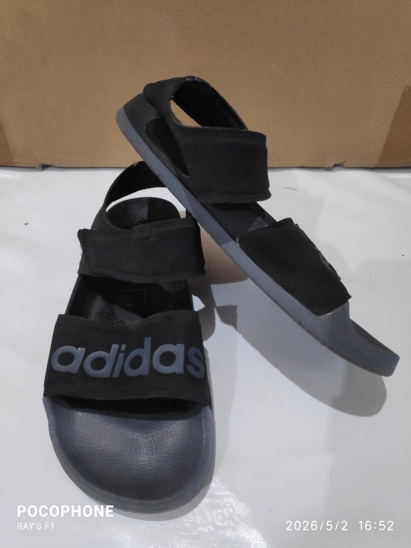 Adidas Black Sandals (Category: Flats & Sandals) located in Pagsanjan. Submitted by rays-days (Listing ID 1457319388, Image 2). Description: - Black Adidas sandals - Adjustable velcro straps for a secure fit - Comfortable for everyday wear - Soles with excellent grip - Made in Vietnam - Size: 5 UK pm me meet up around SANTA CRUZ LAGUNA for shipping, buyer will shoulder the fees.