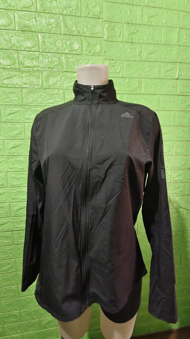 Adidas Black Track Jacket with 3-Stripes (Category: Coats, Jackets and Outerwear) located in Pasay City. Submitted by taytayswifty (Listing ID 1457219565, Image 1). Description: - Classic black Adidas track jacket - Iconic 3-stripes on sleeves - Full zip closure with stand-up collar - Lightweight material, perfect for workouts or casual wear - Adidas logo embroidered on the chest - Simple and timeless design.