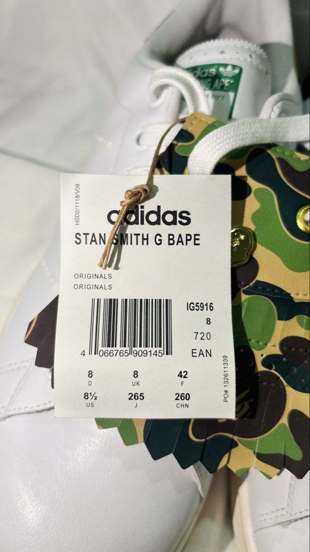 Adidas Stan Smith x BAPE Camo Sneakers (Category: Sneakers) located in Manila. Submitted by jade_67 (Listing ID 1457218967, Image 2). Description: - BAPE x Adidas Stan Smith Collaboration - Classic White Leather Upper - Iconic BAPE Camo Print on Tongue & Heel Tab - Green Accent Details - Original Tags Attached - Size: UK 8 / JPN 26.5 NO BOX!!!!.