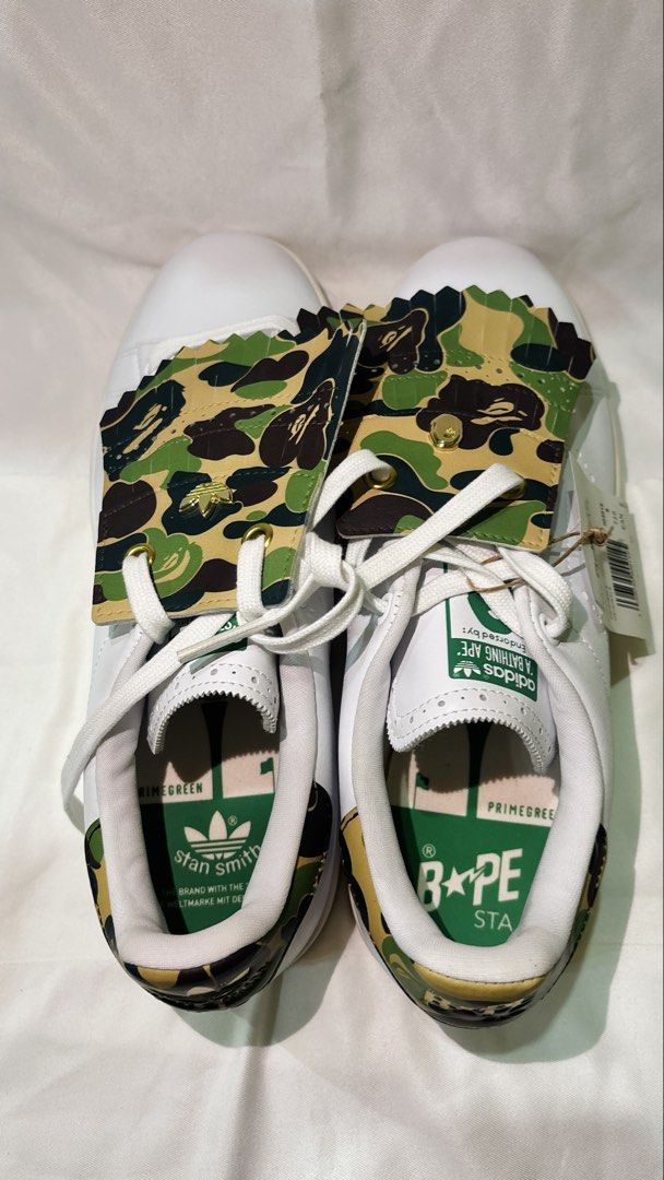 Adidas Stan Smith x BAPE Camo Sneakers (Category: Sneakers) located in Manila. Submitted by jade_67 (Listing ID 1457218967, Image 1). Description: - BAPE x Adidas Stan Smith Collaboration - Classic White Leather Upper - Iconic BAPE Camo Print on Tongue & Heel Tab - Green Accent Details - Original Tags Attached - Size: UK 8 / JPN 26.5 NO BOX!!!!.