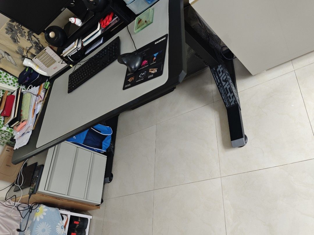Study. Computer Desk (Category: Tables & Sets) located in Singapore. Submitted by clonedroid (Listing ID 1457191444, Image 1). Description: - Desk, perfect for WFH or gaming - Height Cannot be adjusted as motor is spoilt - Spacious and tiltable desk surface - Sturdy legs for stability - Selling as is.