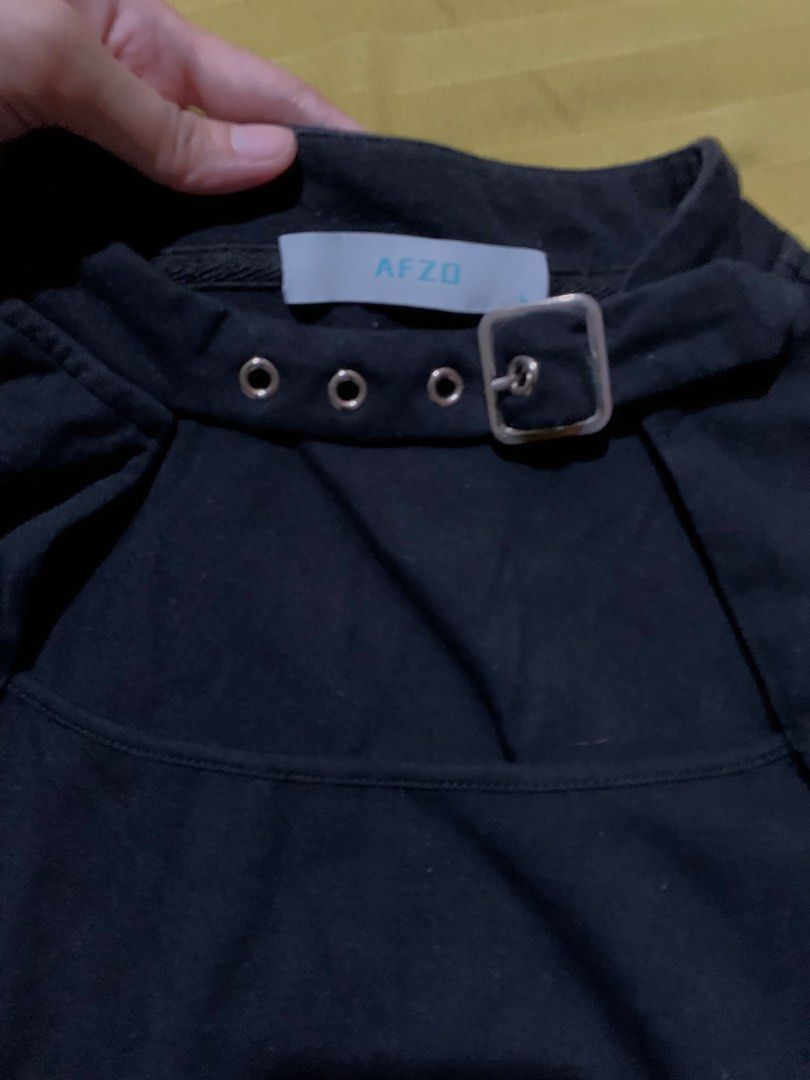 AFZO Black Cut-out Buckle Top (Category: Sleeveless) located in Manila. Submitted by _wtfrn (Listing ID 1457182550, Image 3). Description: Selling my preloved but well loved clothes🎀 📌Black top with buckle strap on neck 📌Size: S-M 📌Once used (no flaws) 📌Color may vary due to lightning 📍Quezon City 🛵Lalamove & Meet up nearby 💌: message me if your interested and will give you discounts🤗 .