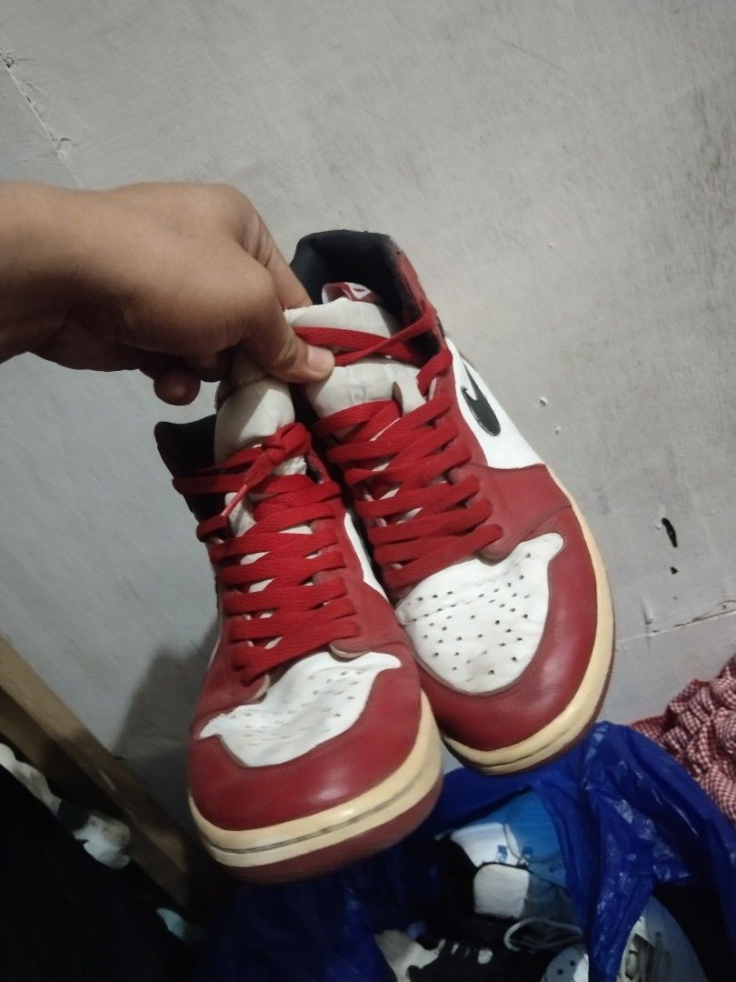 Air Jordan 1 High OG Chicago (Category: Sneakers) located in Paranaque City. Submitted by jayson193 (Listing ID 1457254581, Image 3). Description: - Classic Air Jordan 1 High OG Chicago - Iconic red, white, and black colorway - High-top silhouette - Features red laces - Yellowish-cream sole for a vintage look - A must-have for any sneaker enthusiast's collection.