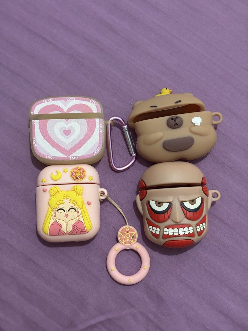AirPods 1/2/3 case bundle (Category: Portable Audio Accessories) located in Bacolod City. Submitted by nczr96 (Listing ID 1457269603, Image 1). Description: Preloved AirPods case bundle! 2 cases for AirPods gen 1/2 - sailormoon - Attack on Titan 2 cases for AirPods gen 3 - pink heart - capybara .