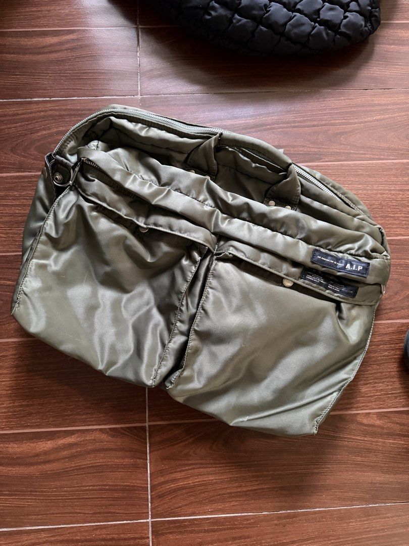 American In Paris convertible bag (Category: Backpacks) located in Manila. Submitted by chattel_mnl (Listing ID 1457234806, Image 2). Description: American In Paris two way bag shoulder bag or backpack packable straps sage green superb quality on par or better than porter no issues 15x20 3500 .