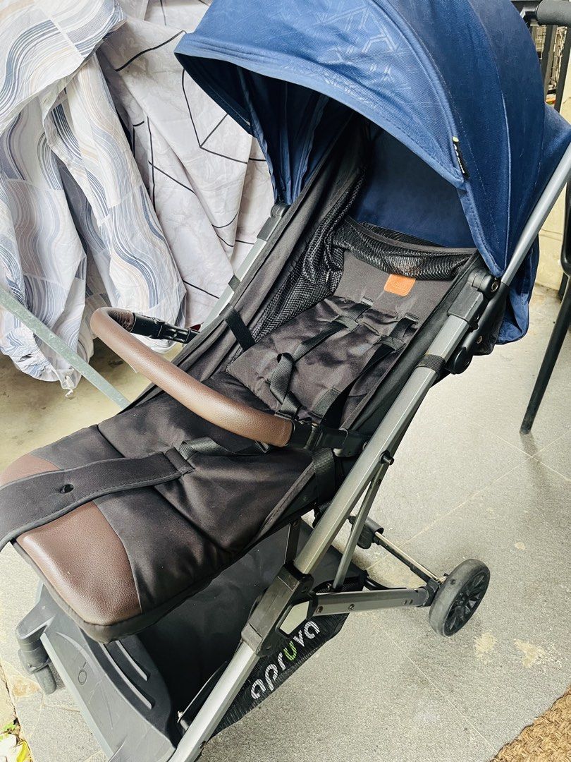 Apruva Trax+ Stroller (Category: Strollers) located in Antipolo. Submitted by gab12821 (Listing ID 1457149878, Image 1). Description: - Aprica Trax+ stroller in navy blue and black. - Equipped with a secure 5-point harness. - Includes a convenient removable bumper bar. - Adjustable canopy for sun protection. - Shows some signs of wear on the frame and wheels, as pictured. - Still fully functional and ready for its next adventure. Bought at 6k .