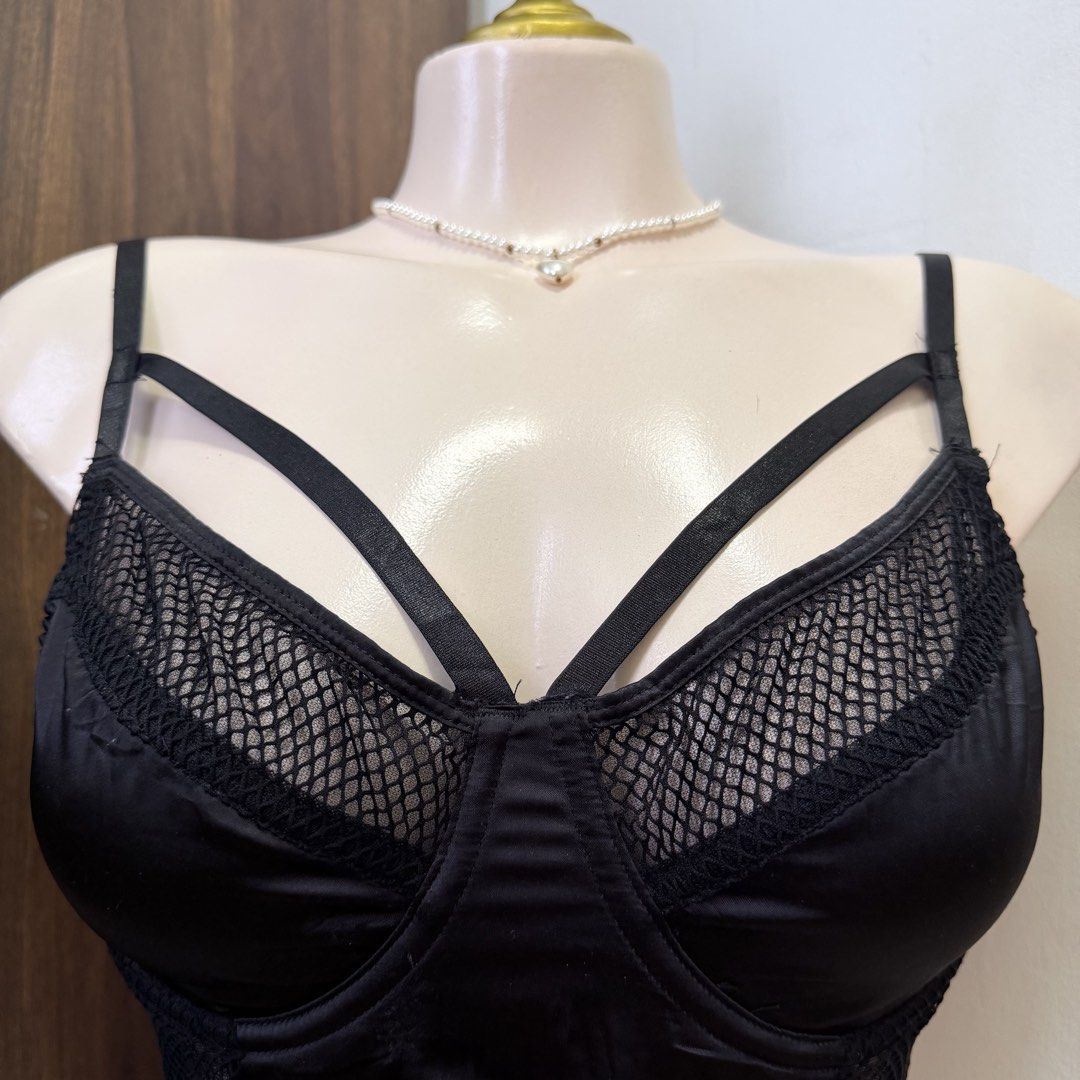 ASOS Black Longline Unlined Bralette [34C] (Category: Undergarments & Loungewear) located in Malabon City. Submitted by k_intimates (Listing ID 1457286976, Image 2). Description: Details: • Size 34C / wired / unlined • Like NEW • Black strappy mesh longline bralette featuring satin panels, underwire cups, and prominent cage-style cross straps. 🤝 First to pay gets the item. No holds. 🚫 Ghost buyers are barred fr future offers..