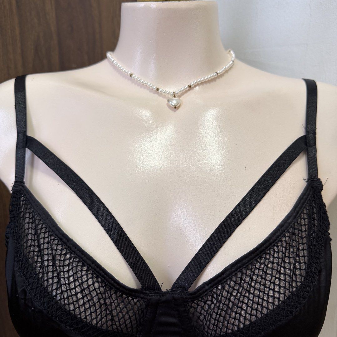ASOS Black Longline Unlined Bralette [34C] (Category: Undergarments & Loungewear) located in Malabon City. Submitted by k_intimates (Listing ID 1457286976, Image 3). Description: Details: • Size 34C / wired / unlined • Like NEW • Black strappy mesh longline bralette featuring satin panels, underwire cups, and prominent cage-style cross straps. 🤝 First to pay gets the item. No holds. 🚫 Ghost buyers are barred fr future offers..