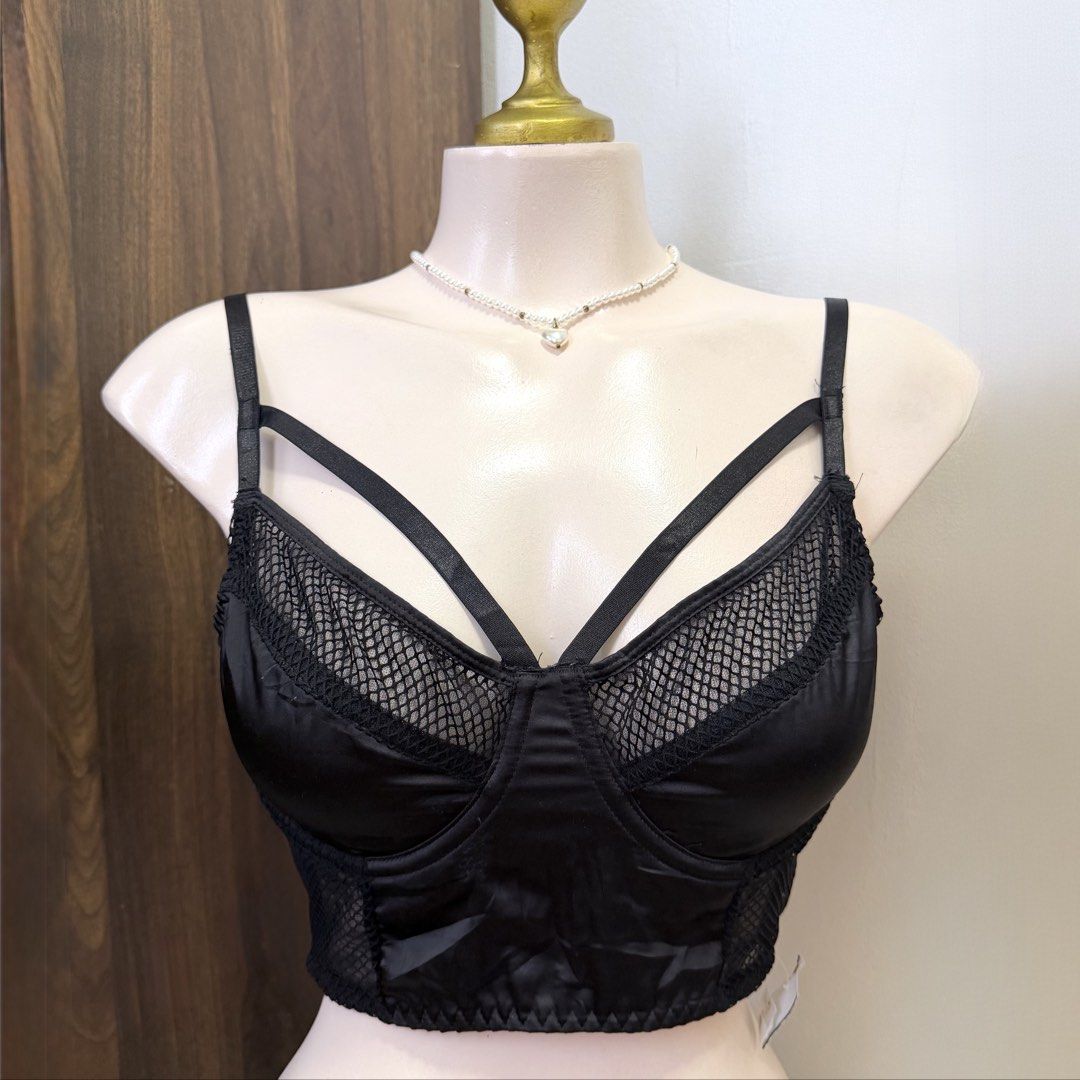 ASOS Black Longline Unlined Bralette [34C] (Category: Undergarments & Loungewear) located in Malabon City. Submitted by k_intimates (Listing ID 1457286976, Image 1). Description: Details: • Size 34C / wired / unlined • Like NEW • Black strappy mesh longline bralette featuring satin panels, underwire cups, and prominent cage-style cross straps. 🤝 First to pay gets the item. No holds. 🚫 Ghost buyers are barred fr future offers..