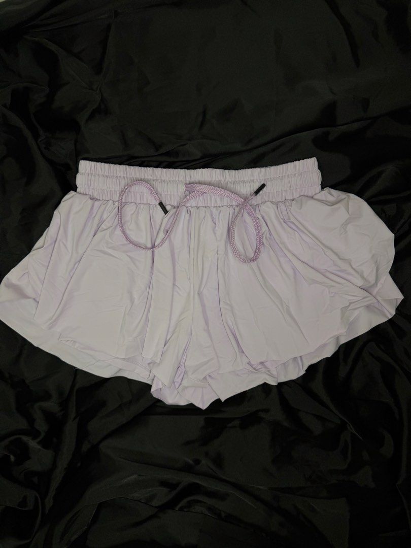 Athletic Flowy Shorts for women (Category: Shorts) located in Manila. Submitted by mralde3031 (Listing ID 1457302251, Image 1). Description: Used once. Thick fabric. Perfect for running/yoga/pickleball. Lavender color. With inside shorts + pockets.