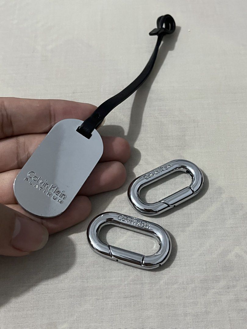 AUTHENTIC CALVIN KLEIN KEYCHAIN AND LOCK (Category: Luxury Accessories) located in Quezon City. Submitted by hilligna (Listing ID 1457258094, Image 3). Description: Authentic Calvin Klein Keychain and Lock for sale Sobrang ganda at tibay na lock ng CK Very authentic and Rare PM for interested buyer.