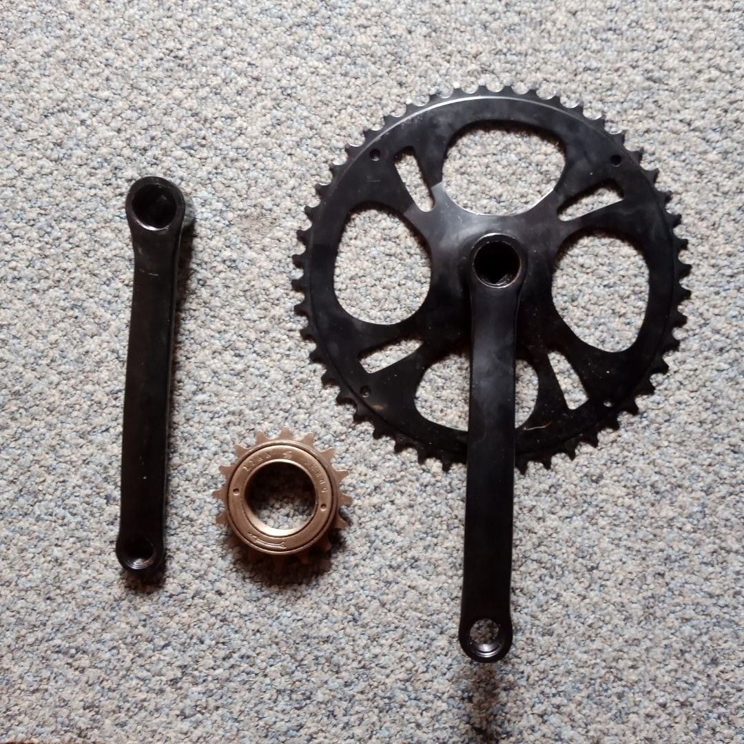 Black Bicycle Crankset with Chainring and Freewheel (Category: Bicycles) located in Manila. Submitted by ohyeah_7 (Listing ID 1457233464, Image 1). Description: - Black crank arms - Black chainring with 48teeth - Single speed gold-toned freewheel included 16t - Ideal for single speed bike builds or upgrades - Feel free to ask any questions!.