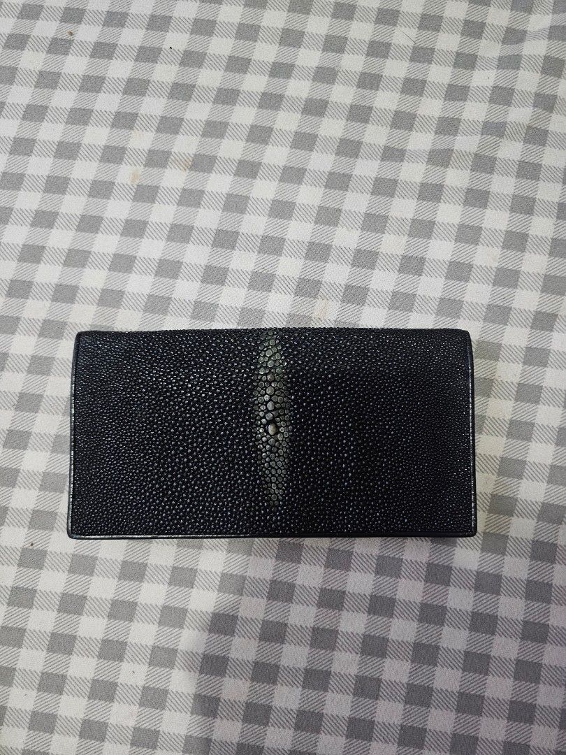 Black Stingray Leather Bi-fold Wallet (Category: Wallets & Card holders) located in Manila. Submitted by jannabianca (Listing ID 1457241354, Image 1). Description: - Genuine black stingray leather bi-fold wallet - Unique, eye-catching textured front - Slim profile, perfect for pocket-friendly storage - Ideal for carrying cards and cash - Shows slight signs of wear on the edges.