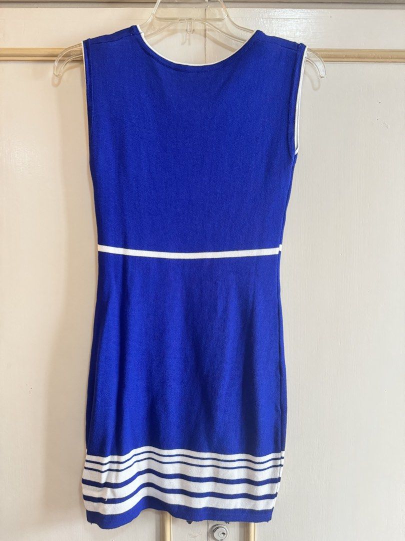 Blue Sleeveless Knit Dress (Category: Dresses) located in Manila. Submitted by hakunashop (Listing ID 1457196491, Image 3). Description: Blue Knit Dress 💙 Classic sleeveless knit dress in royal blue with white trim and stripe details. Stretchy, comfortable, and flattering when worn. Condition: Preloved, in good condition Color: Royal Blue / White Actual photos included. Worn photo for fit reference..