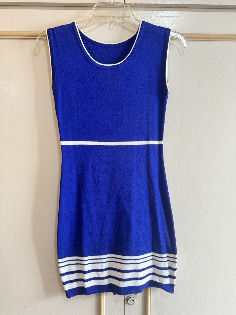 Blue Sleeveless Knit Dress (Category: Dresses) located in Manila. Submitted by hakunashop (Listing ID 1457196491, Image 2). Description: Blue Knit Dress 💙 Classic sleeveless knit dress in royal blue with white trim and stripe details. Stretchy, comfortable, and flattering when worn. Condition: Preloved, in good condition Color: Royal Blue / White Actual photos included. Worn photo for fit reference..