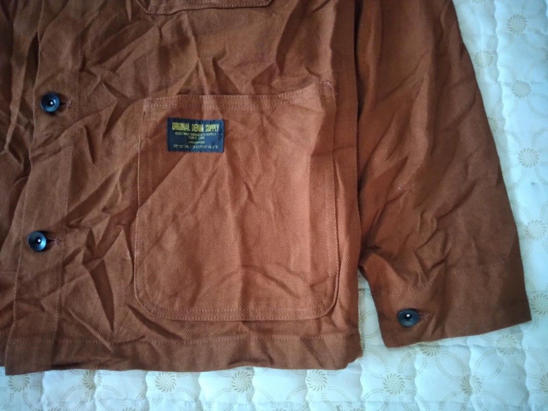 Brown Chore Jacket Cords Collar As New (Category: Coats, Jackets and Outerwear) located in Zamboanga. Submitted by nurbya898048 (Listing ID 1457207948, Image 3). Description: Brown workwear style jacket from Jambangee. Features a corduroy collar and button-up front. Two chest pockets and two lower pockets. Button cuffs. Great for layering. Original Denim Supply tag visible. It is typically made from heavy Canvass or duck cotton to handle wear and