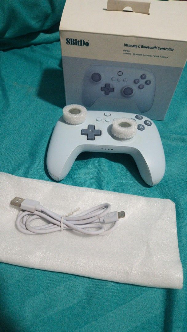 BUNDLE! Mortal Kombat 11 Nintendo Switch Game & 8BitDo Controller (Category: Nintendo) located in Paranaque City. Submitted by mauandchelliedeclutters (Listing ID 1457252278, Image 2). Description: - Mortal Kombat 11 for Nintendo Switch - White 8BitDo Ultimate C Bluetooth Controller - Includes charging cable - Comes with original box Bundle already! Take both for 2k! Rfs: son doesn't want it na.