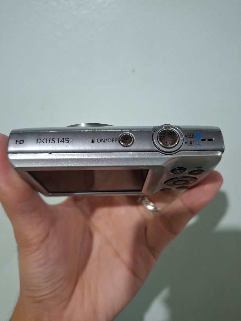 Canon Ixus 145 (Category: Cameras) located in Dagupan City. Submitted by gadgets_by_pxtrade (Listing ID 1457270292, Image 3). Description: Canon IXUS 145 SALE: 6 999 + sf Features: Compact & stylish digicam 16 MP CCD sensor 8x Optical zoom HD video recording Great for that classic digicam look Body condition: 7.5/10 — with signs of usage. No port cover. All functions are working with no known issues. Inclusions: Pouch SD card Beaded strap Clip Ch