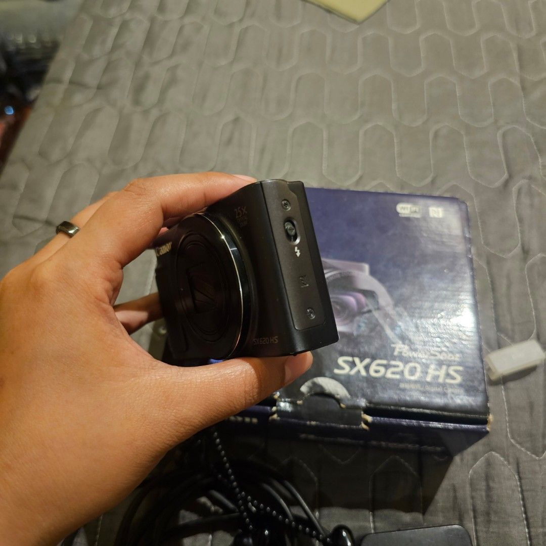 Canon PowerShot SX620 HS Digital Camera with Accessories (Category: Cameras) located in Marikina City. Submitted by aitaaaag (Listing ID 1457285213, Image 3). Description: - Canon PowerShot SX620 HS Camera - 20.2 Megapixels - 25x Optical Zoom - Includes Original Box - Original Battery Charger & Power Cord - Original Battery - Memory card - Wrist Strap Included - Ideal for everyday photos and travel.