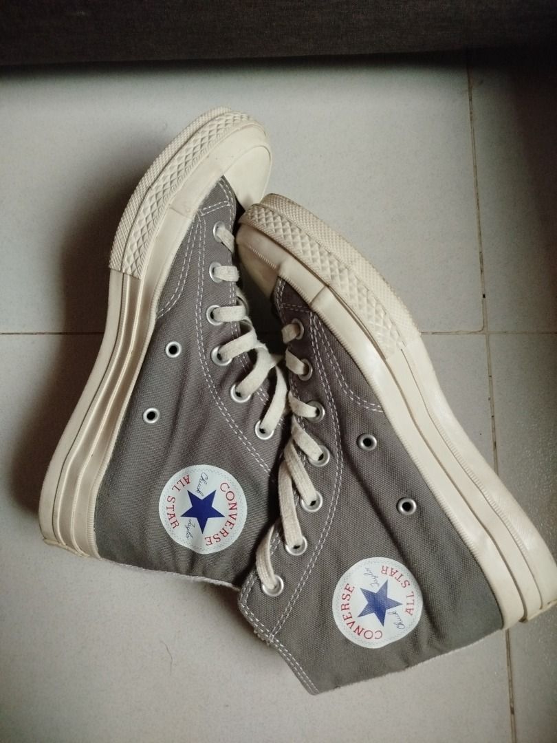 CDG x Converse Chuck Taylor All Star High Grey (Category: Dress Shoes) located in Cebu City. Submitted by kathleenpatac7 (Listing ID 1457216575, Image 2). Description: - Grey Comme des Garçons PLAY x Converse Chuck Taylor All Star high-top sneakers - Features the iconic heart logo on the side - Classic canvas upper with rubber sole - Laces are intact - Size: 7.5 US Women's.