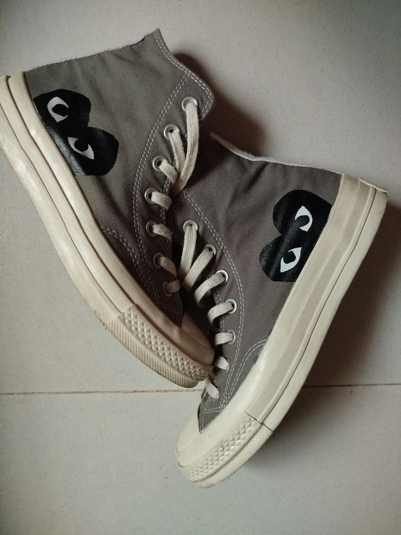 CDG x Converse Chuck Taylor All Star High Grey (Category: Dress Shoes) located in Cebu City. Submitted by kathleenpatac7 (Listing ID 1457216575, Image 1). Description: - Grey Comme des Garçons PLAY x Converse Chuck Taylor All Star high-top sneakers - Features the iconic heart logo on the side - Classic canvas upper with rubber sole - Laces are intact - Size: 7.5 US Women's.