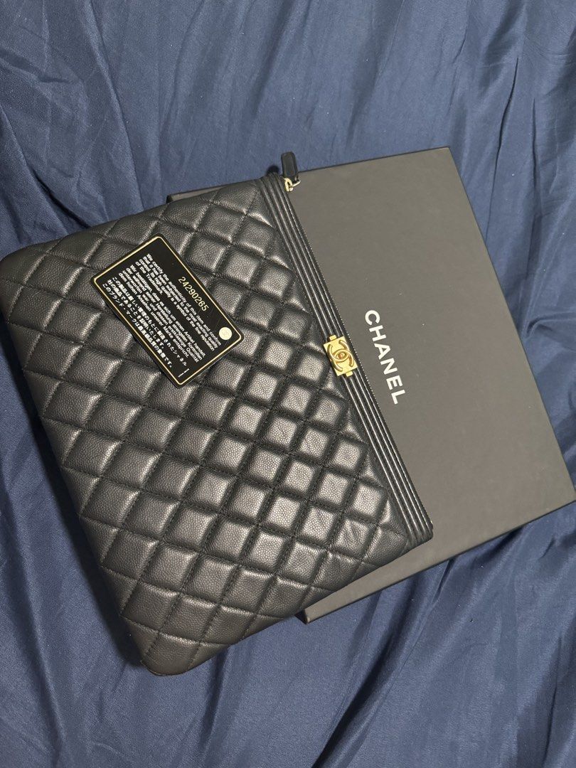 Chanel Black Quilted Leather Clutch Bag (Category: Luxury Bags & Wallets) located in Bulacan. Submitted by mal29 (Listing ID 1457169983, Image 1). Description: - Authentic Chanel clutch bag - Black quilted leather - Gold hardware - Serial number: 24290265 - Comes with original box - Ideal for evenings out or as a statement piece - holo intact .