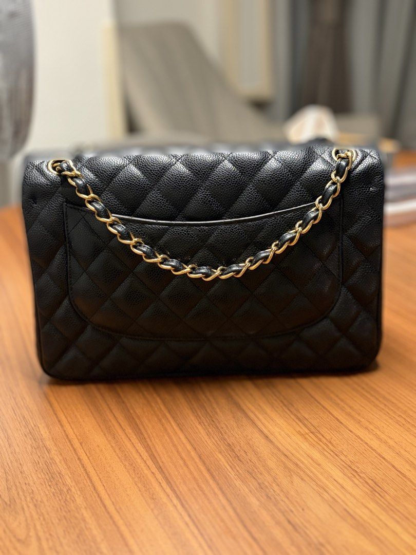 Chanel Classic Double Flap in Jumbo (Category: Luxury Bags & Wallets) located in Pasig City. Submitted by ivanvibal (Listing ID 1457299862, Image 2). Description: Jumbo Size Gold hardware Caviar leather Complete with dustbag, certificate and entrupy ***Open for trade in for Classic double flap in size Medium.
