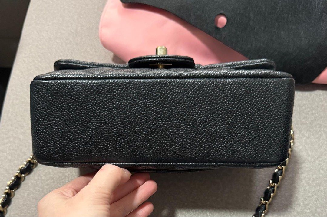 Chanel Mini Rectangular GHW (Category: Bags & Wallets) located in Singapore. Submitted by mr.endless (Listing ID 1457207976, Image 2). Description: - Classic Chanel flap bag - Black caviar leather with quilted pattern - Gold chain strap - Iconic CC turn-lock closure - Back pocket detail - Versatile for day or night wear - A timeless wardrobe essential - Full set, series 25, pristine.