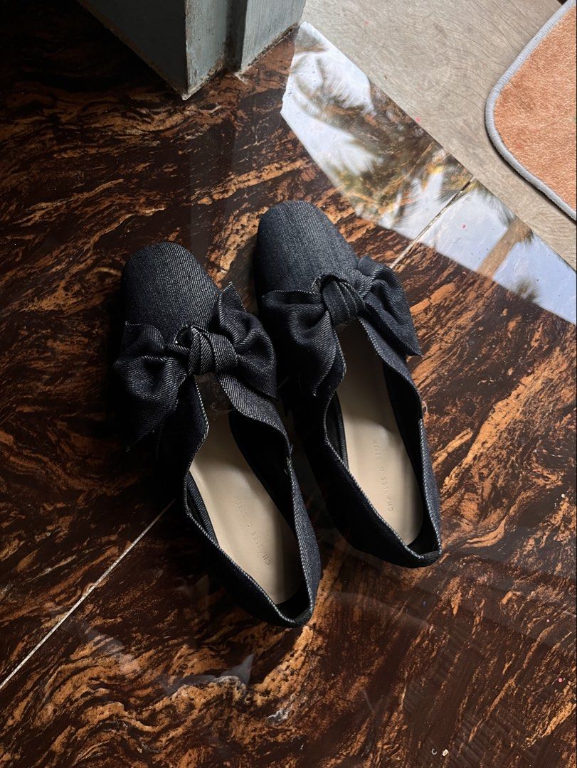 Charles & Keith Dark Blue Denim Flats Size 39 (Category: Flats & Sandals) located in Masbate. Submitted by leylauren_16 (Listing ID 1457233731, Image 1). Description: - Charles & Keith dark blue denim flats - Size 39 - Textured sole for enhanced grip - Denim material with a subtle shimmer - Easy slip-on style - Ideal for casual outfits.