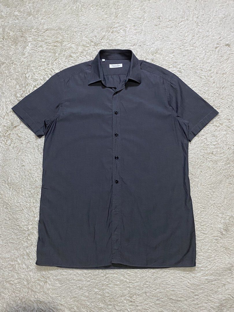 CHRISTIAN DIOR SHORT SLEEVED POLO (Category: Luxury Apparel) located in Cavite. Submitted by nld_thrift (Listing ID 1457262437, Image 2). Description: CHRISTIAN DIOR SHORT SLEEVED POLO W21.5 L 30.5 18Shoulder to Shoulder Made in Italy 100% Cotton No refund/ no return, ask before buy, all sales are final. IF YOU ARE IN DOUBT ABOUT ANY DETAILS OF THE ITEM YOU’RE PURCHASING PLEASE FEEL FREE TO CONTACT US .
