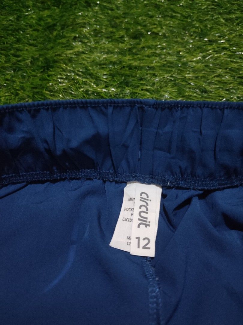 Circuit Navy Blue Running Shorts (Category: Shorts) located in Cebu City. Submitted by deadjay84 (Listing ID 1457258556, Image 3). Description: Circuit Navy Blue Running Shorts - Size 12 - Fits 30-32 - Elastic waistband with drawstring - Side pockets - Reflective details on sides - Ideal for workouts or casual wear pls see photos for details Cebu loc add shipping.
