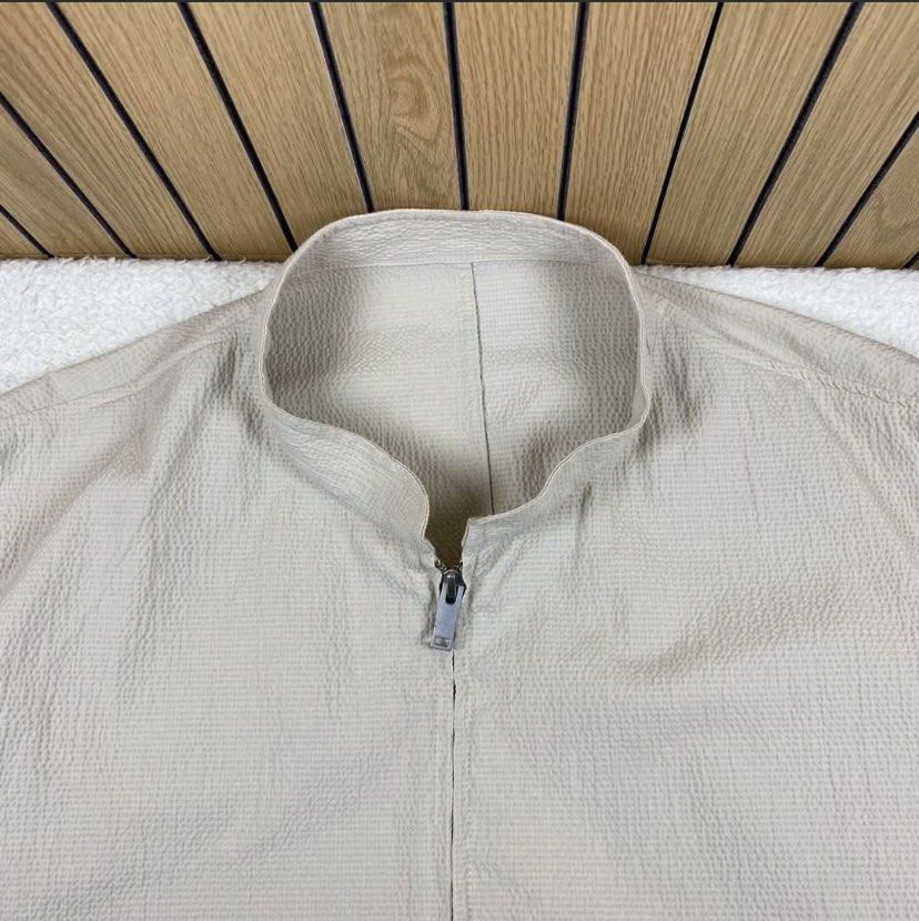 Cos Seersucker Blouson Cropped Double Zip Jacket (Category: Coats, Jackets and Outerwear) located in Bacolod City. Submitted by treasurehunts.6100 (Listing ID 1457268708, Image 2). Description: Cos Seersucker Blouson Cropped Double Zip Jacket Condition - New Color - Cream Color rate - 9.8 / 10 Material - 72% Cotton , 27% Polyester , 1% Elastine Made in Turkey Flaws - Dot Dirt ( Barely Noticeable ) Size XL Dimensions : Width - 24 Length - 27 Shoul