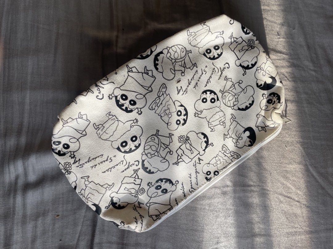 Crayon Shin-chan Pouch Cosmetic Bag (Category: Purses & Pouches) located in Santa Barbara. Submitted by frryt (Listing ID 1457171341, Image 2). Description: - Adorable Crayon Shin-chan all-over print pouch. - Ideal for storing makeup, stationery, or other essentials. - Secure zipper closure. - Clean and spacious interior. - A must-have for any Shin-chan fan!.