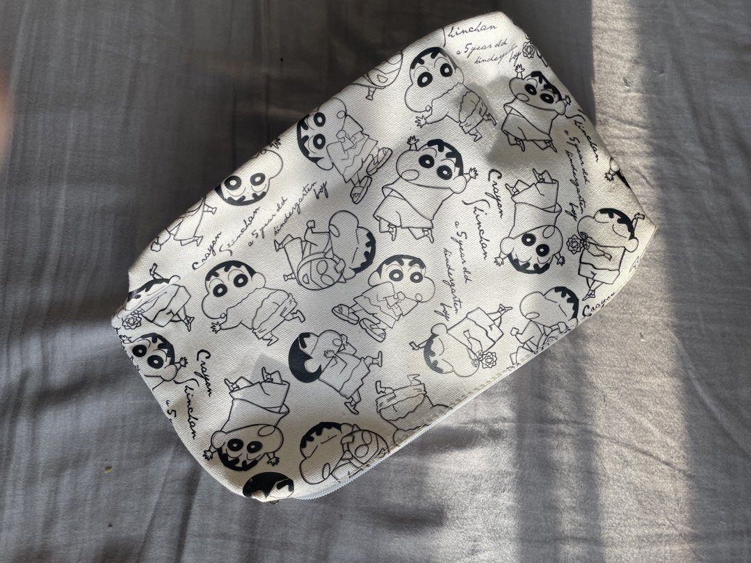 Crayon Shin-chan Pouch Cosmetic Bag (Category: Purses & Pouches) located in Santa Barbara. Submitted by frryt (Listing ID 1457171341, Image 1). Description: - Adorable Crayon Shin-chan all-over print pouch. - Ideal for storing makeup, stationery, or other essentials. - Secure zipper closure. - Clean and spacious interior. - A must-have for any Shin-chan fan!.