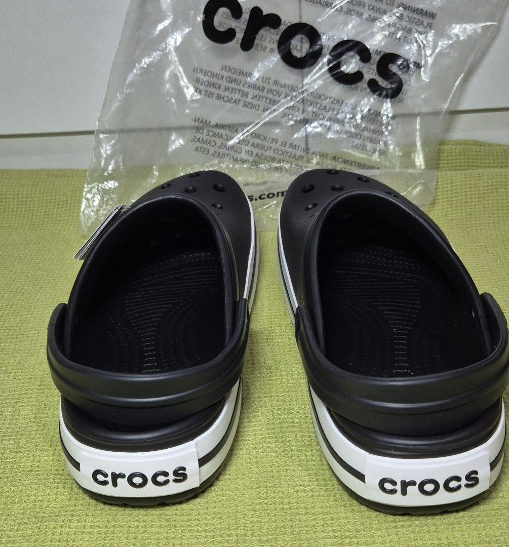 Crocs Crocband Clog in Black (Category: Slippers & Slides) located in Rosales. Submitted by georgiey0w (Listing ID 1457317379, Image 3). Description: -Original with tags and packaging from US. Included in the photos attached. -Below SRP. P3,795 on L@zada in Crocs' official store as of Aug. 24, 2026. -RFS: Padala, not my size and not a fan of crocs. 😅✌️ -Size: M 10 US -SF: C/o buyer.