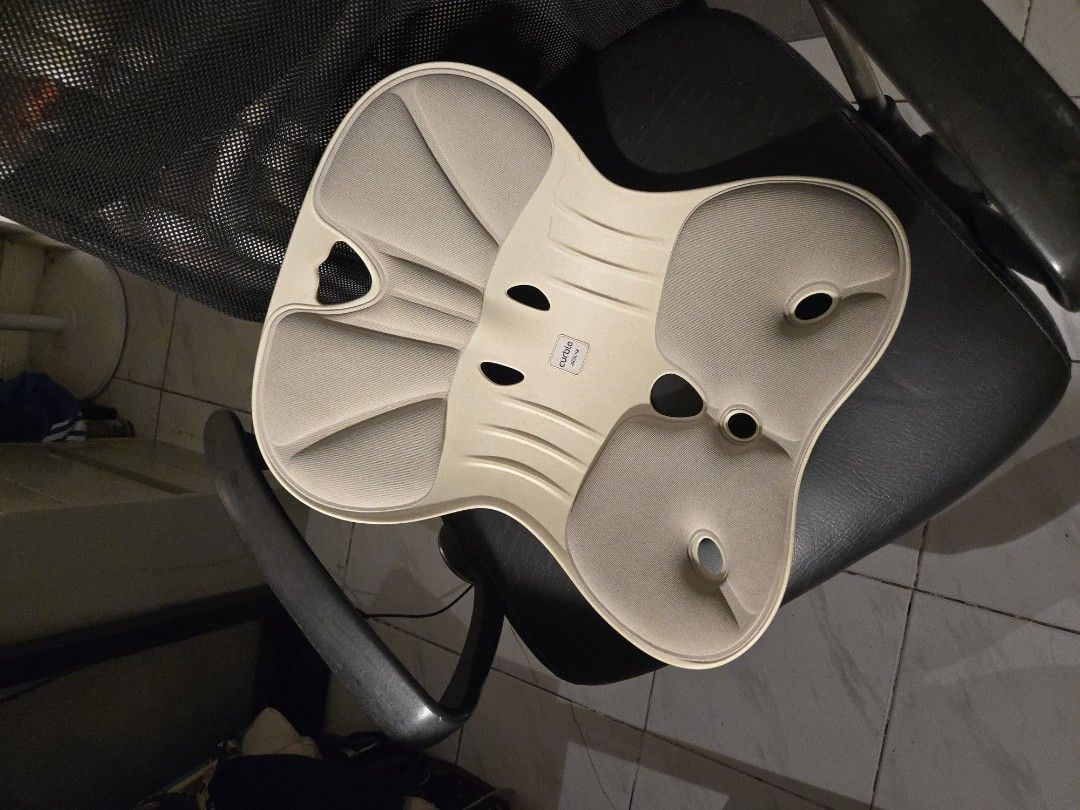Curble Posture Chair Cushion - Back Support (Category: Braces, Support & Protection) located in Quezon City. Submitted by cchescaa (Listing ID 1457277431, Image 3). Description: - Enhances sitting posture - Ergonomic design for maximum comfort - Universally fits most chairs - Ideal for office and home use Curble Wide. Price is negotiable.