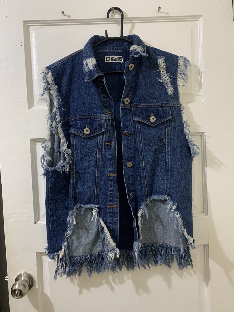 Denim Vest Graphic Print Distressed (Category: Vests) located in Bacoor. Submitted by ianmagdale (Listing ID 1457251654, Image 1). Description: - Unique denim vest with a cool graphic print on the back. - Distressed look with ripped edges and frayed hem for a rugged style. - Sleeveless design, ideal for layering over tees or hoodies. - A standout piece to add to your wardrobe..