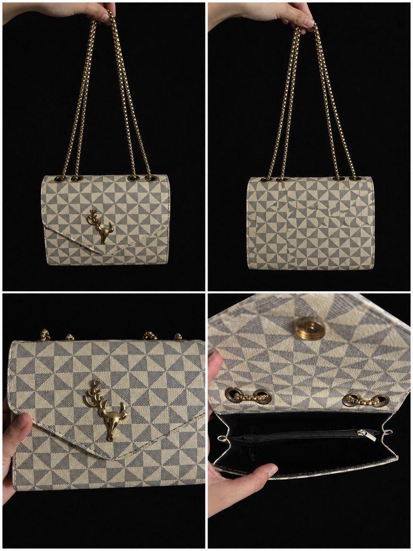 Designer Inspired Monogram Chain Shoulder Bag with Deer Clasp (Category: Luxury Bags & Wallets) located in Manila. Submitted by vastmountain_c8d32d (Listing ID 1457315960, Image 1). Description: DECLUTTERRING Personal items ‼️ - Cute shoulder bag with classic monogram pattern - Features a gold deer clasp on the front flap - Gold chain strap - Interior zippered compartment - Ideal for nights out or adding a chic touch to everyday outfits - Compact