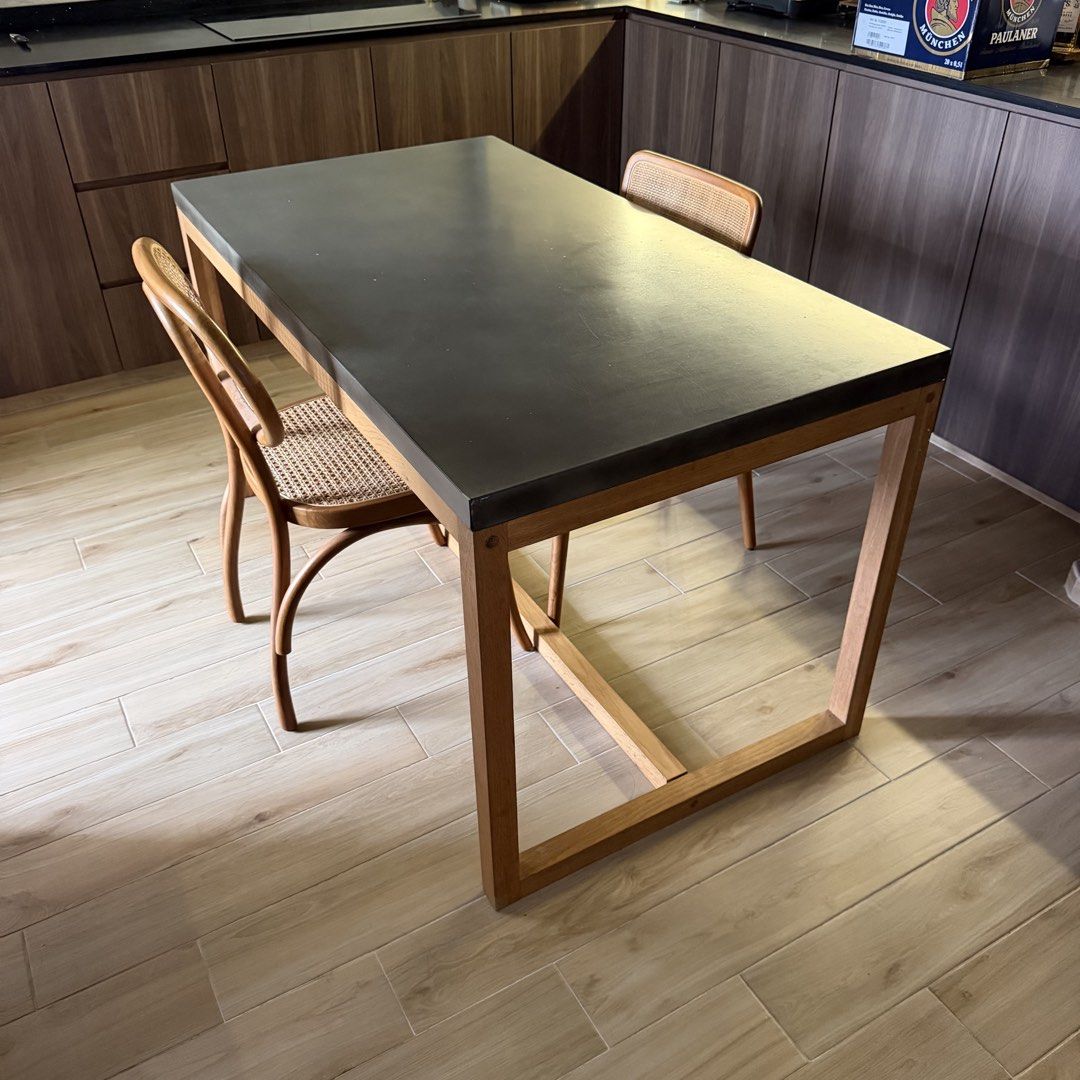 Dining table (Category: Tables & Sets) located in Singapore. Submitted by aggressive_sg (Listing ID 1457180202, Image 2). Description: concrete like table top. Delivery not included. Self collect / self arrange lala move Dimension Width 75cm Length 140cm Height 75.5cm.