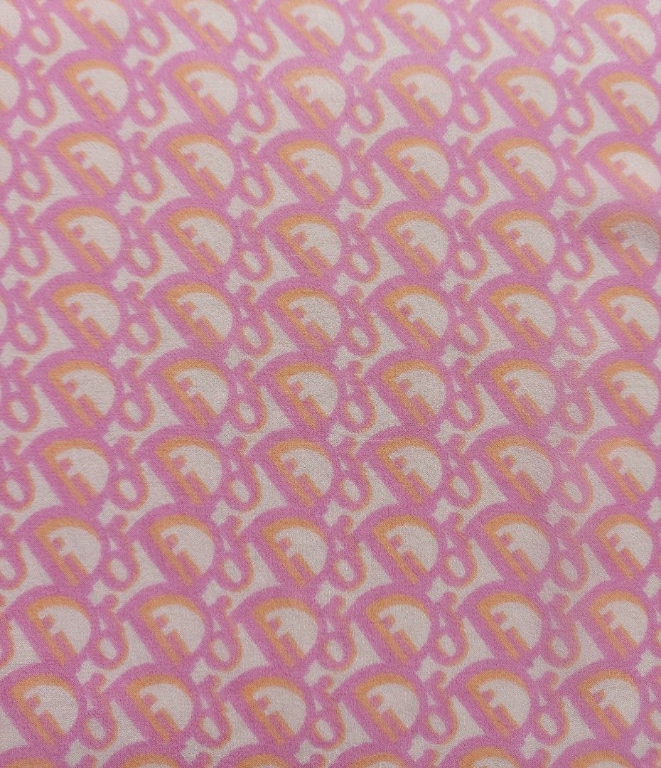 Dior Silk Scarf (Category: Scarves) located in Lapu Lapu. Submitted by agnesapm_29813 (Listing ID 1457267423, Image 1). Description: - Authentic Dior silk scarf - Iconic Diorissimo monogram pattern - Beautiful pink and orange colorway - Measurements: 22 inches x 23.5 inches - Versatile styling: neck, bag accessory, or hair tie - Missing tag - With runs, please see last picture - Washed and ironed already.
