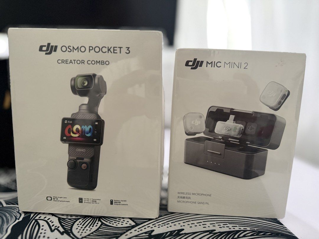 DJI Osmo Pocket 3 Creator Combo & Mic Mini 2 (Category: Video Cameras) located in Manila. Submitted by emenel (Listing ID 1457204779, Image 1). Description: - Brand New DJI Osmo Pocket 3 Creator Combo & DJI Mic Mini 2 - Osmo Pocket 3 Features: 1-inch CMOS sensor, 2-inch rotatable touchscreen - DJI Mic Mini 2: Wireless microphone system - Perfect for vlogging, content creation, and capturing high-quality video - Both items are new in box Bale 3 mi
